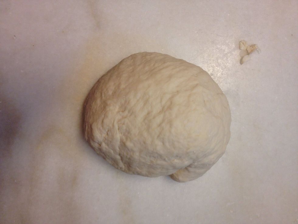 Work in as much flour as possible to form a firm and stiff dough.
