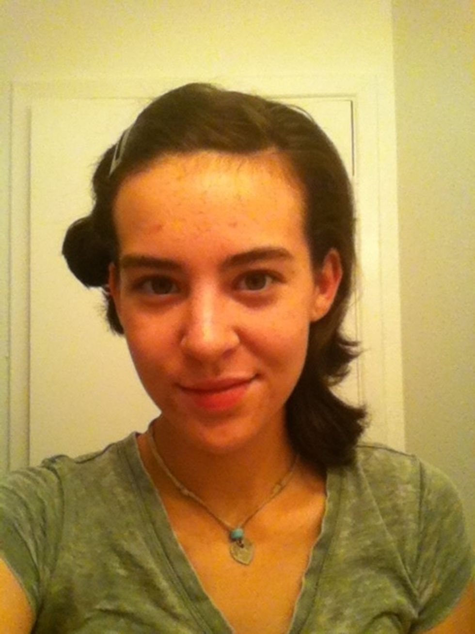 Work the product all thought the side of your hair that you're working with. Then brush it straight back.