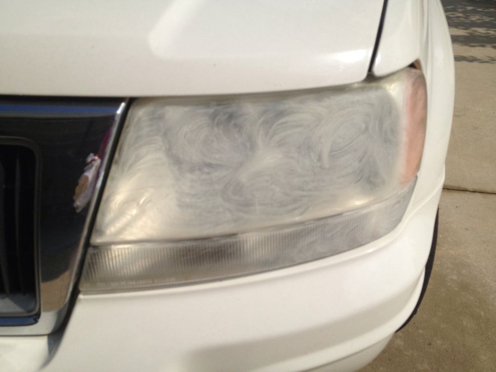 Work toothpaste over entire lense. Putting some elbow grease into it!