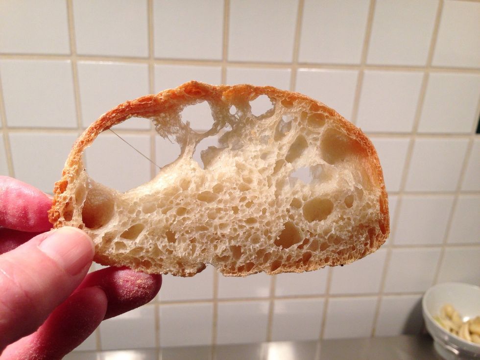 Worth the wait? Yes! Look at those holes, and that crazy strand of gluten! I think it's gluten but I don't really know. You could look it up. Next, we'll fill the holes with butter!