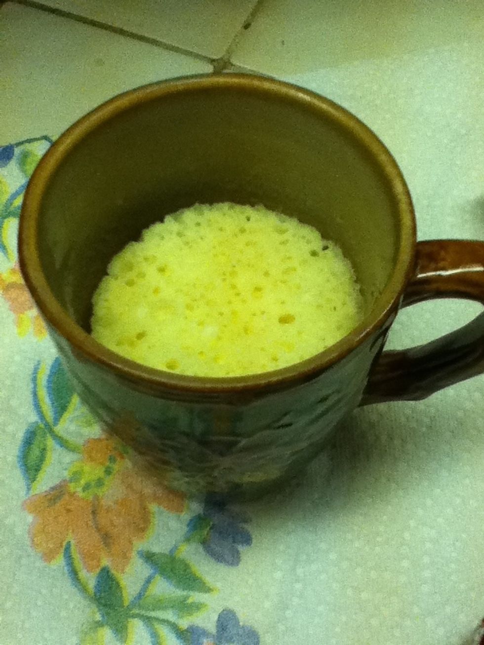 Wow! How did that happen? The mug may be hot when you remove it from the microwave, so be cautious.