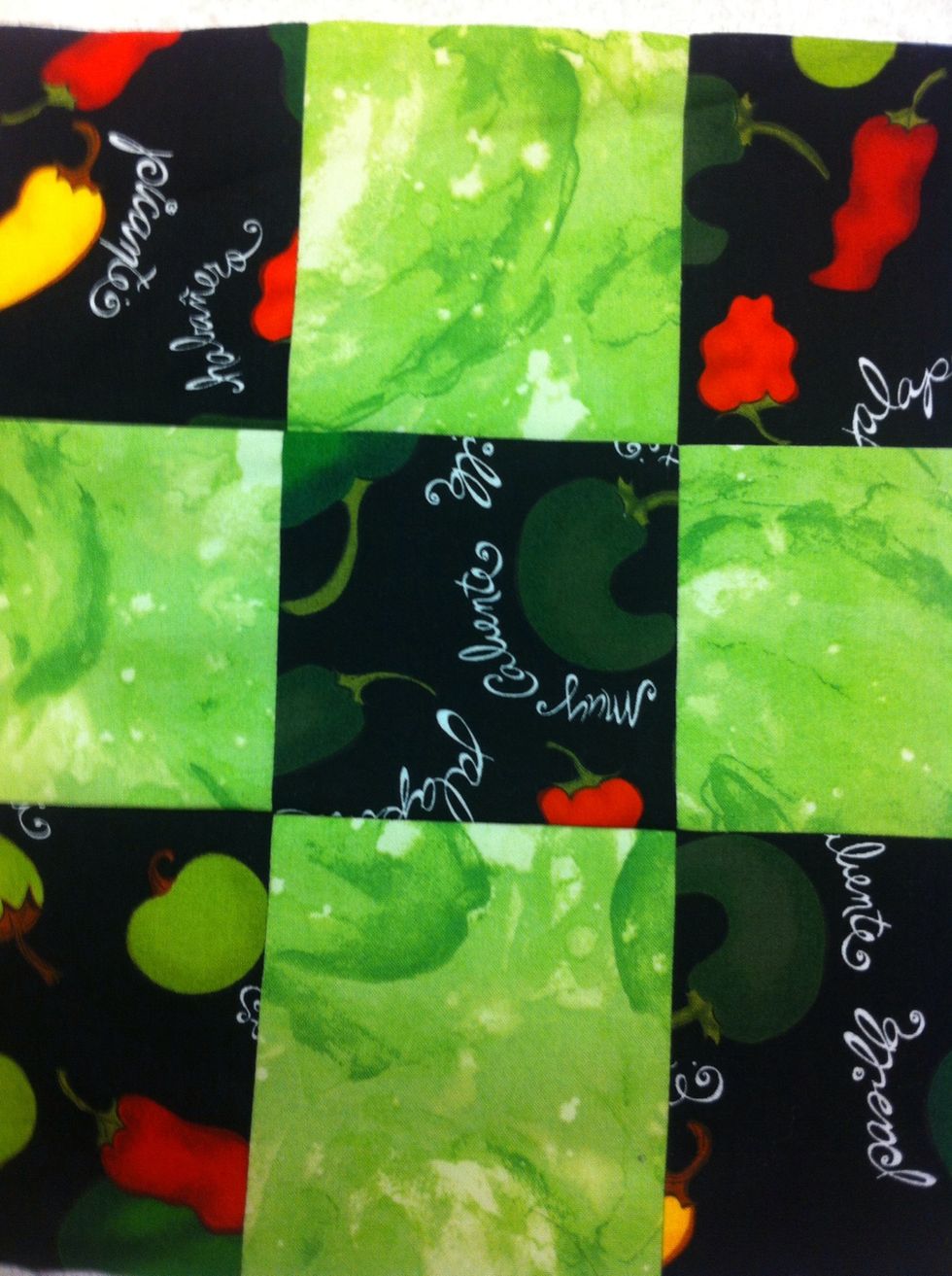 WOW! You just made two 9-patch quilt blocks!! Make some more for yourself OR find some friends and swap blocks. BTW if you use regular yardage, not fat-quarters, cut your strips 4-1/2" by WOF (42")