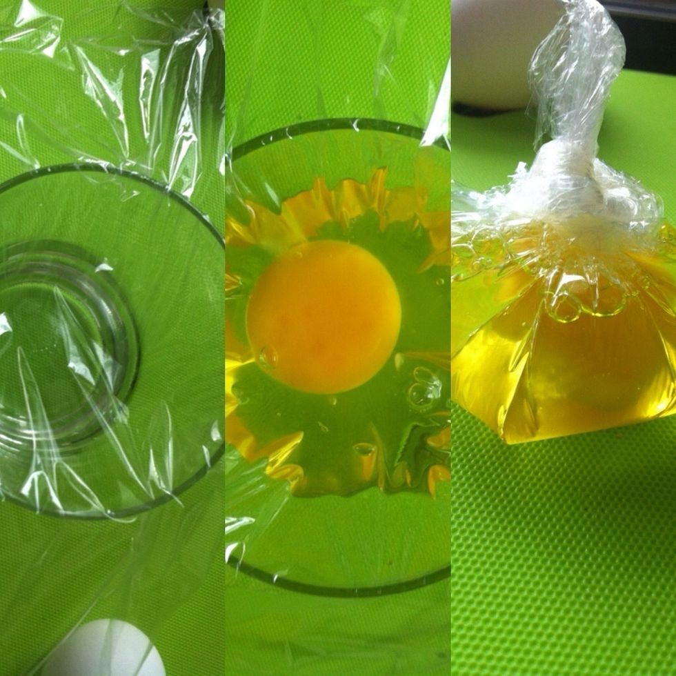 Wrap a cup or glass brush with oil then crack ur egg on the wrap then tighten the top