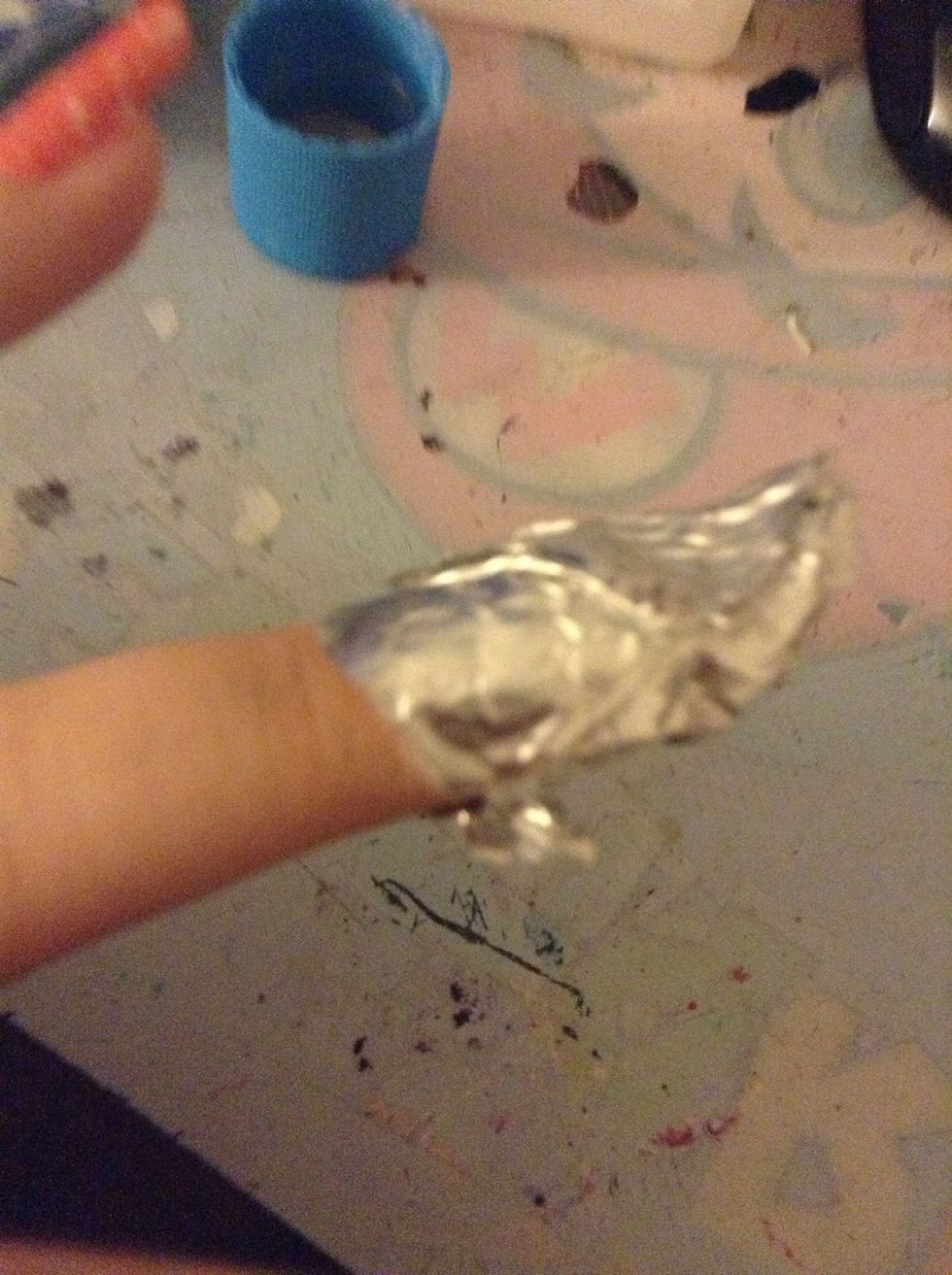 Wrap a piece of tinfoil completely around your finger. Leave it on for at least five minutes.