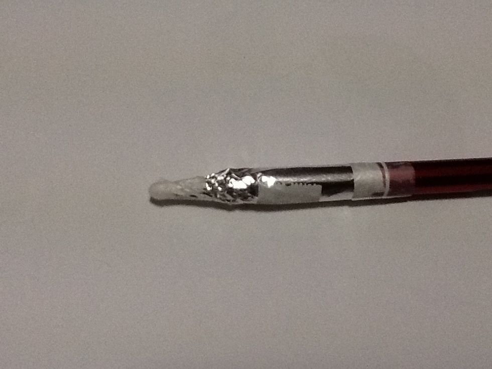 Wrap aluminium foil around pen (make sure it also touches the cotton bud) and secure with tape.