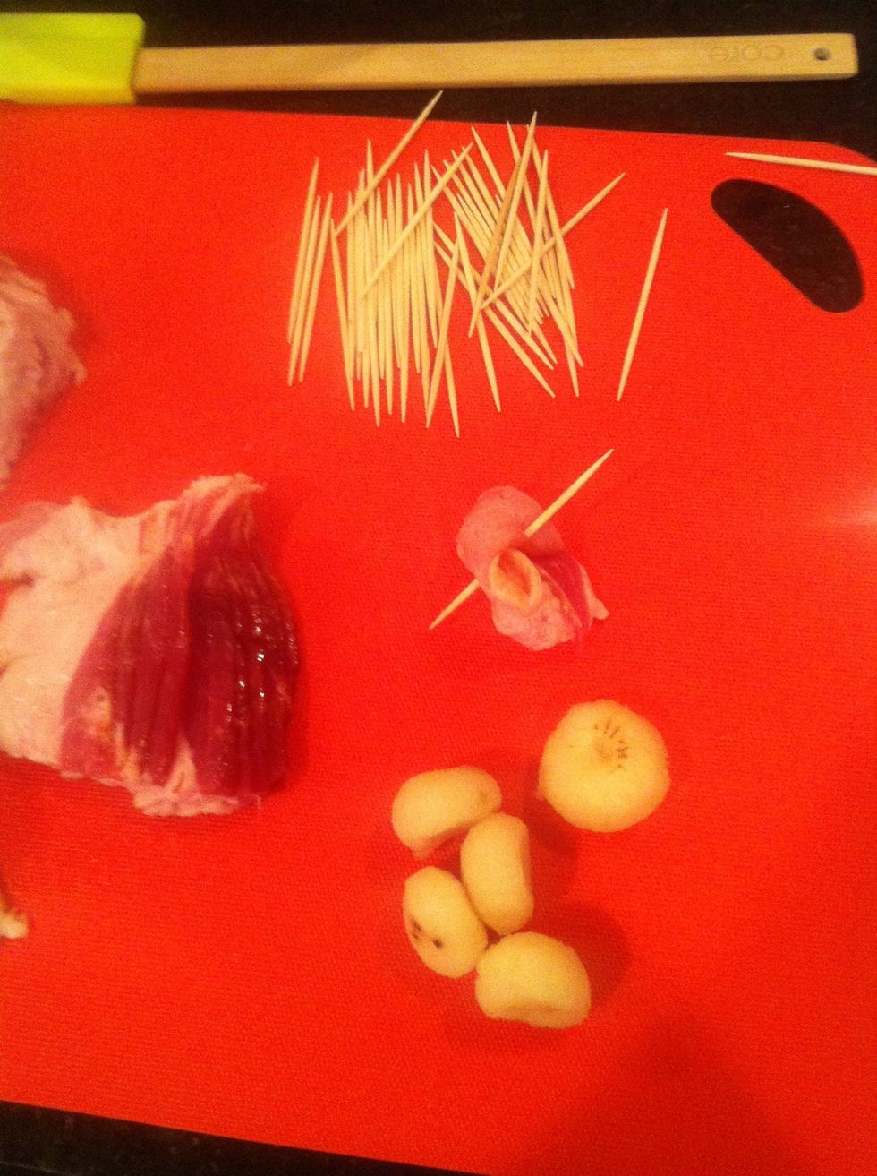 Wrap bacon around chestnut, impale it with a toothpick to hold its place