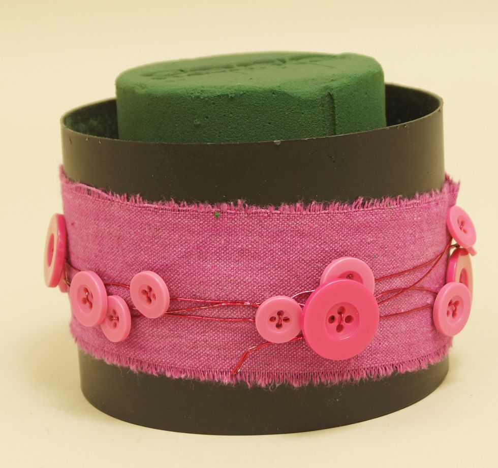 Wrap Button Wire onto of Raw Muslin.