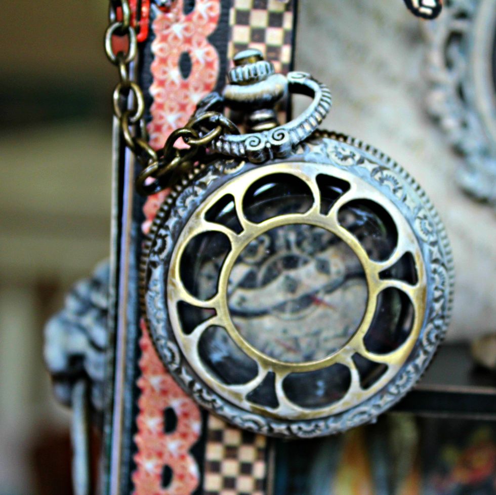 Wrap chain around wrist of hand and attach to pocket watch. Adhere watch to front of hall tree. Dry brush pocket watch with Titan Buff.