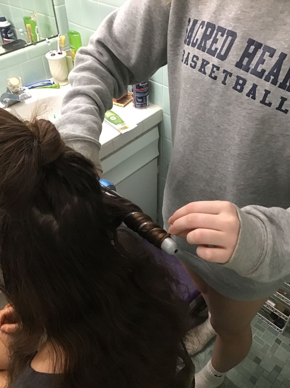 Wrap hair around the wand, and repeat this all over the hair.