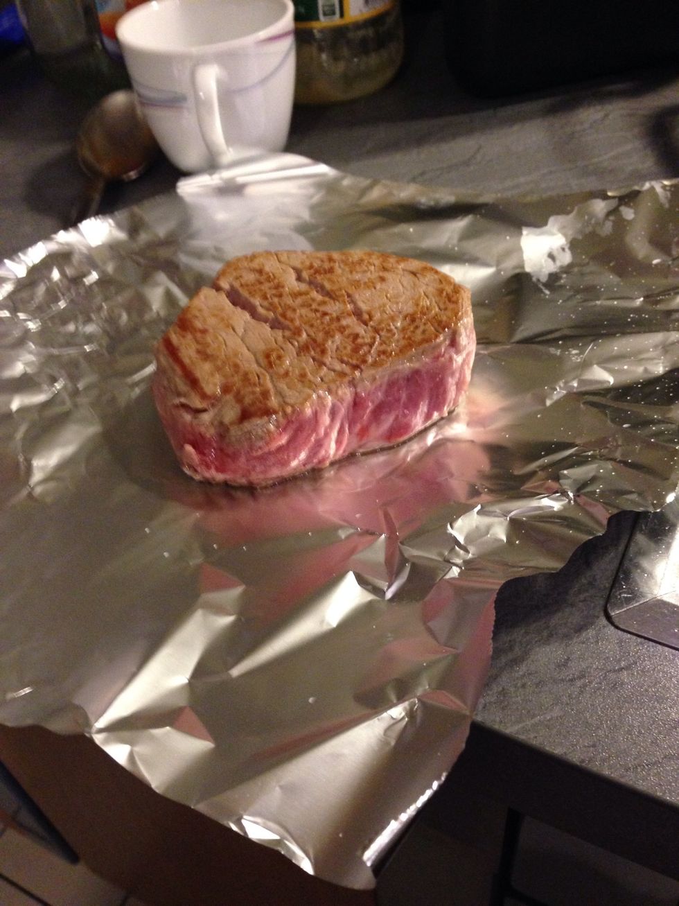 Wrap in foil and place the steak into the preheated oven by 160 degrees
