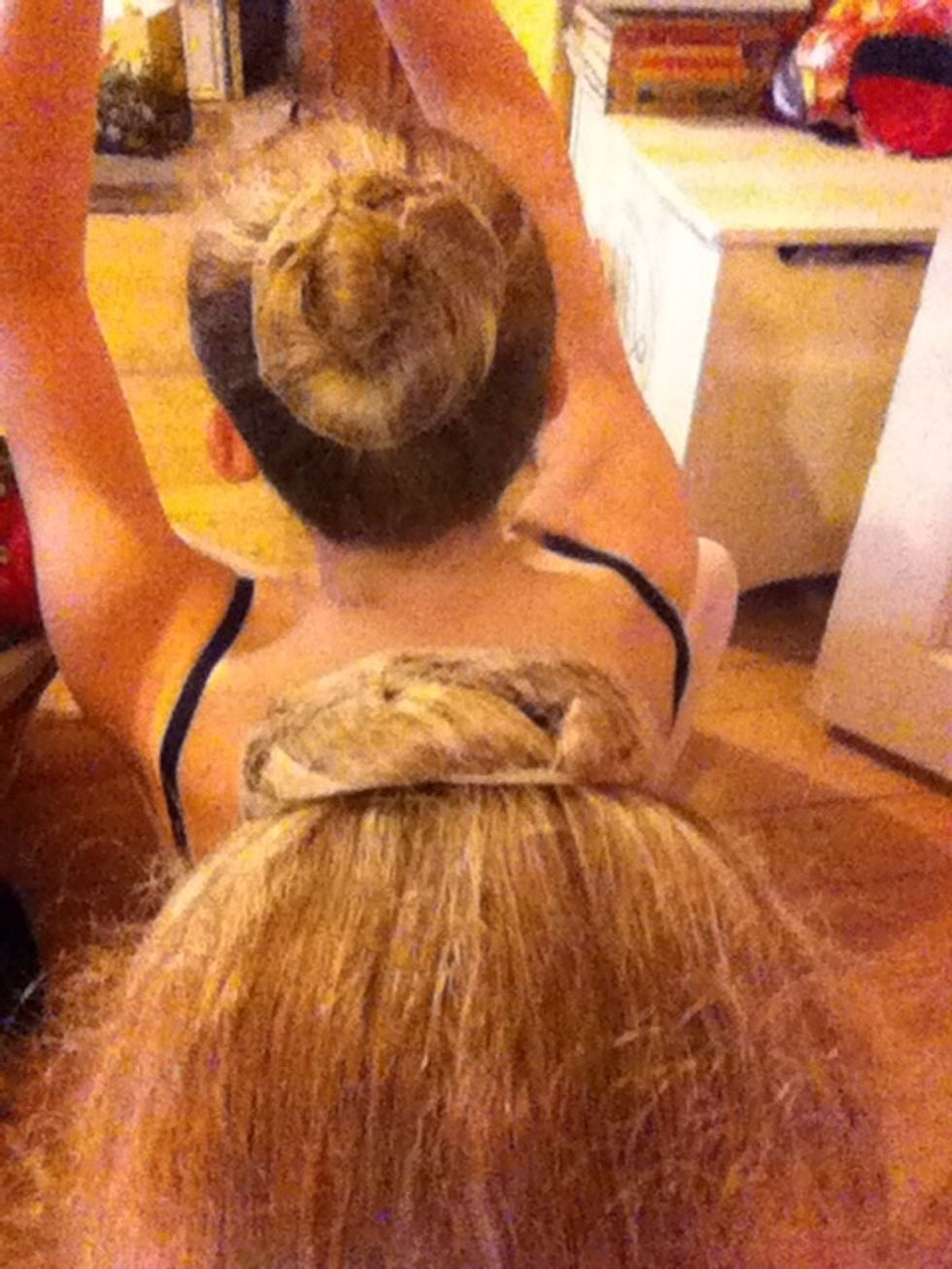 Wrap it around the bun so it is tight and no hair is sticking out