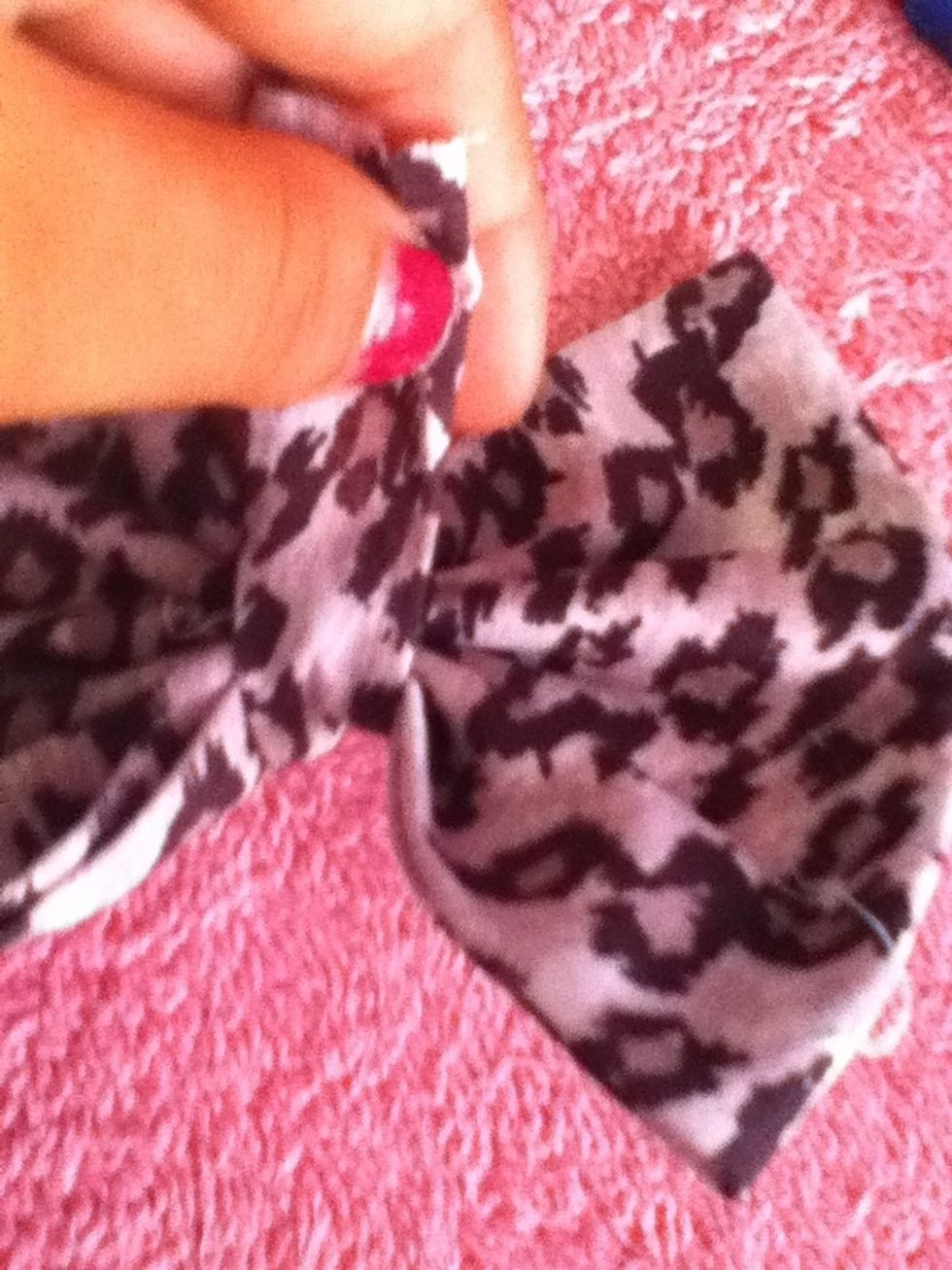 Wrap it around the front, if it is upside down, it should look like this.