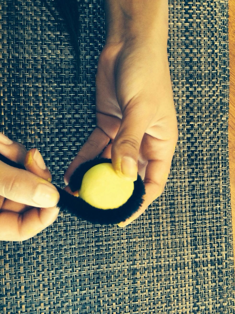 Wrap it around the middle of the ball.