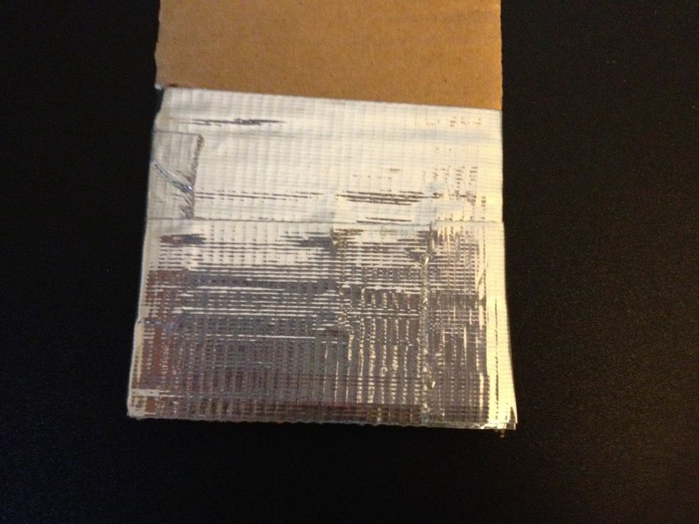 Wrap it around the piece of cardboard.