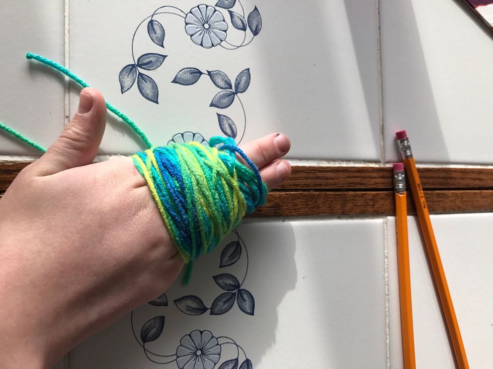 Wrap it around your fingers 150-200 times