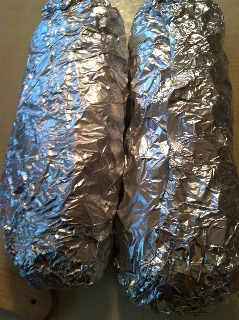 Wrap potatoes in foil and then wrap a second time. Each packet should have two laters if foil.