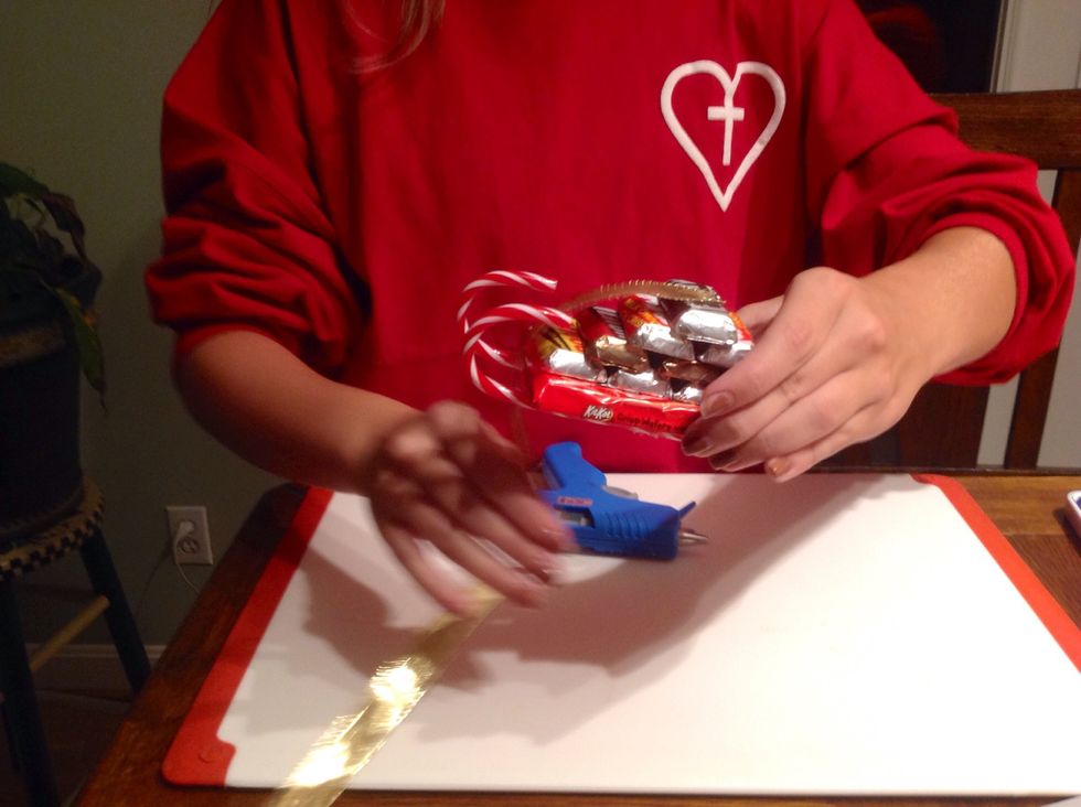 Wrap ribbon around the sides, front, and back.