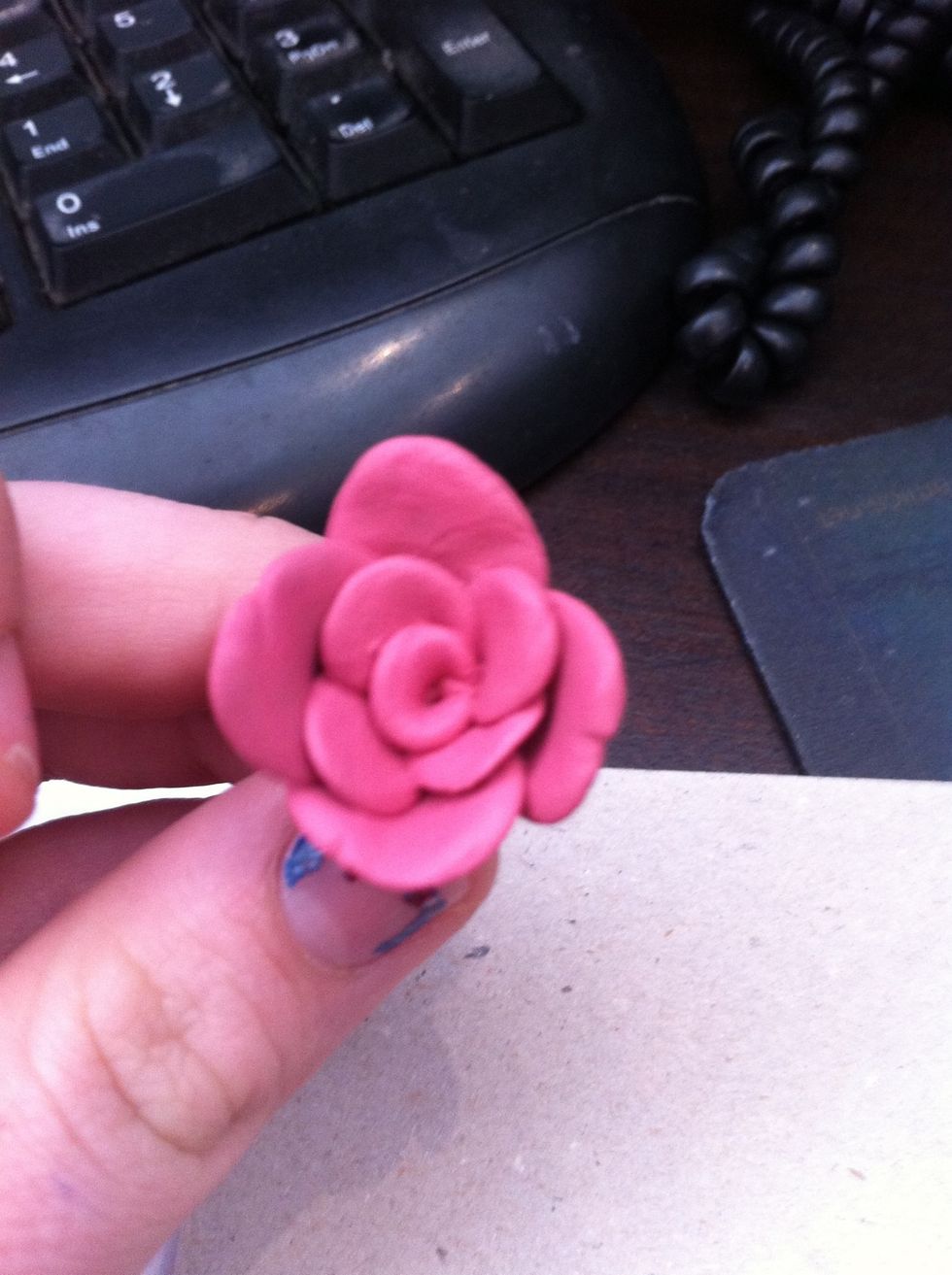 wrap the 4 large ones around in the grooves of the small ones