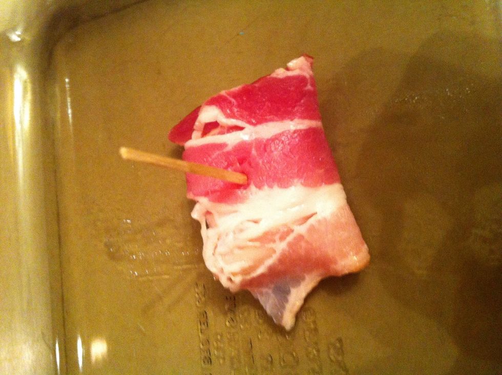 Wrap the bacon and place the toothpick right on the water chest nut to keep the wrap in place.