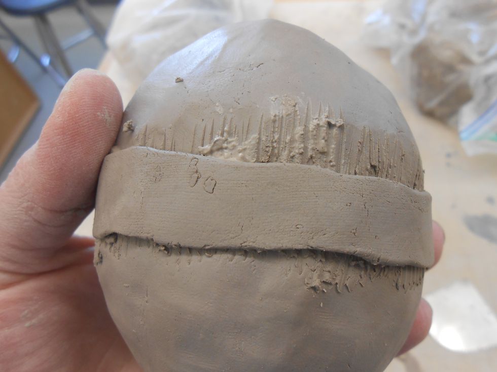 wrap the band-aid around on the scored and slipped area