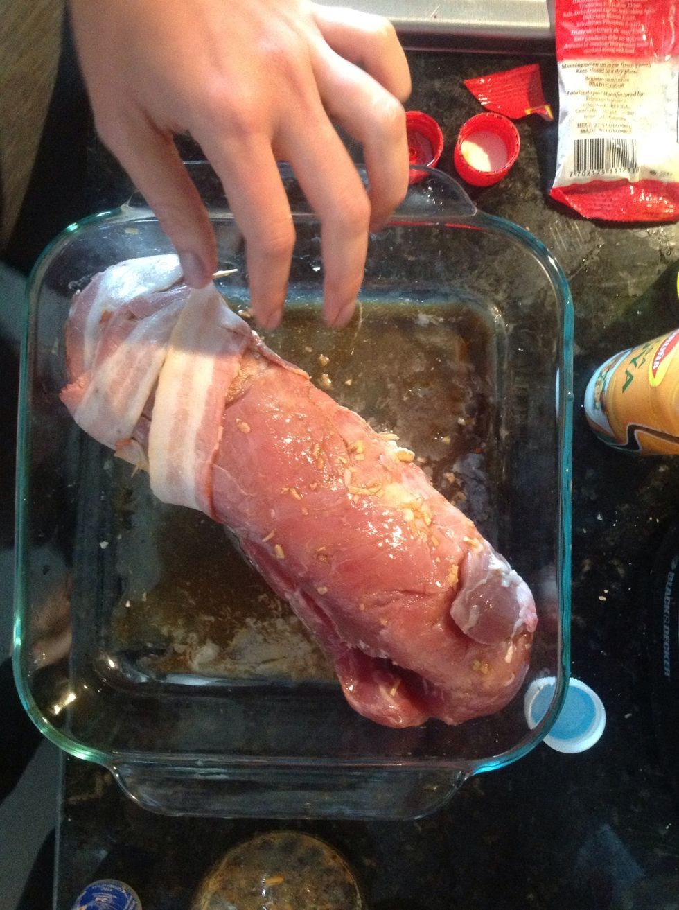 Wrap the beef with bacon strips...