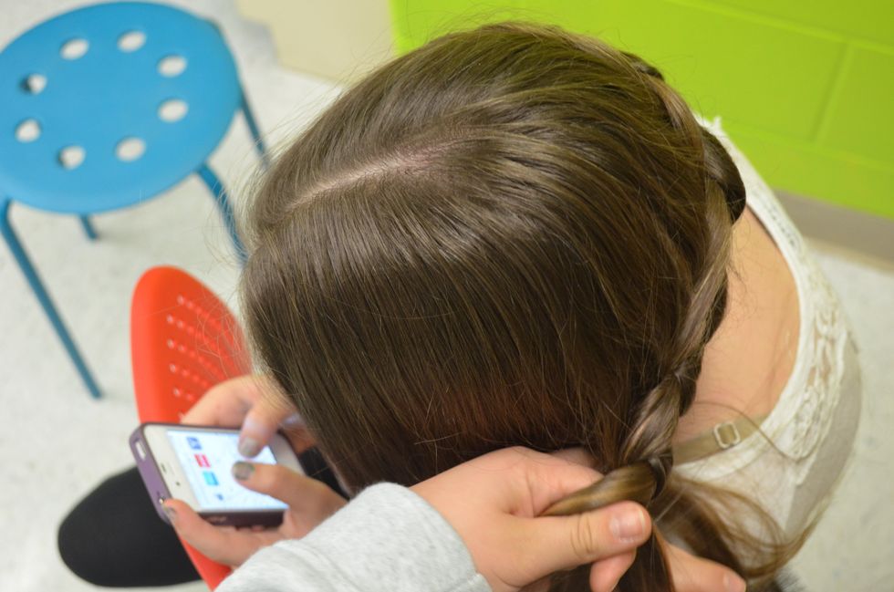 Wrap the braid around your head and get ready to break off and make a normal braid to finish it off.