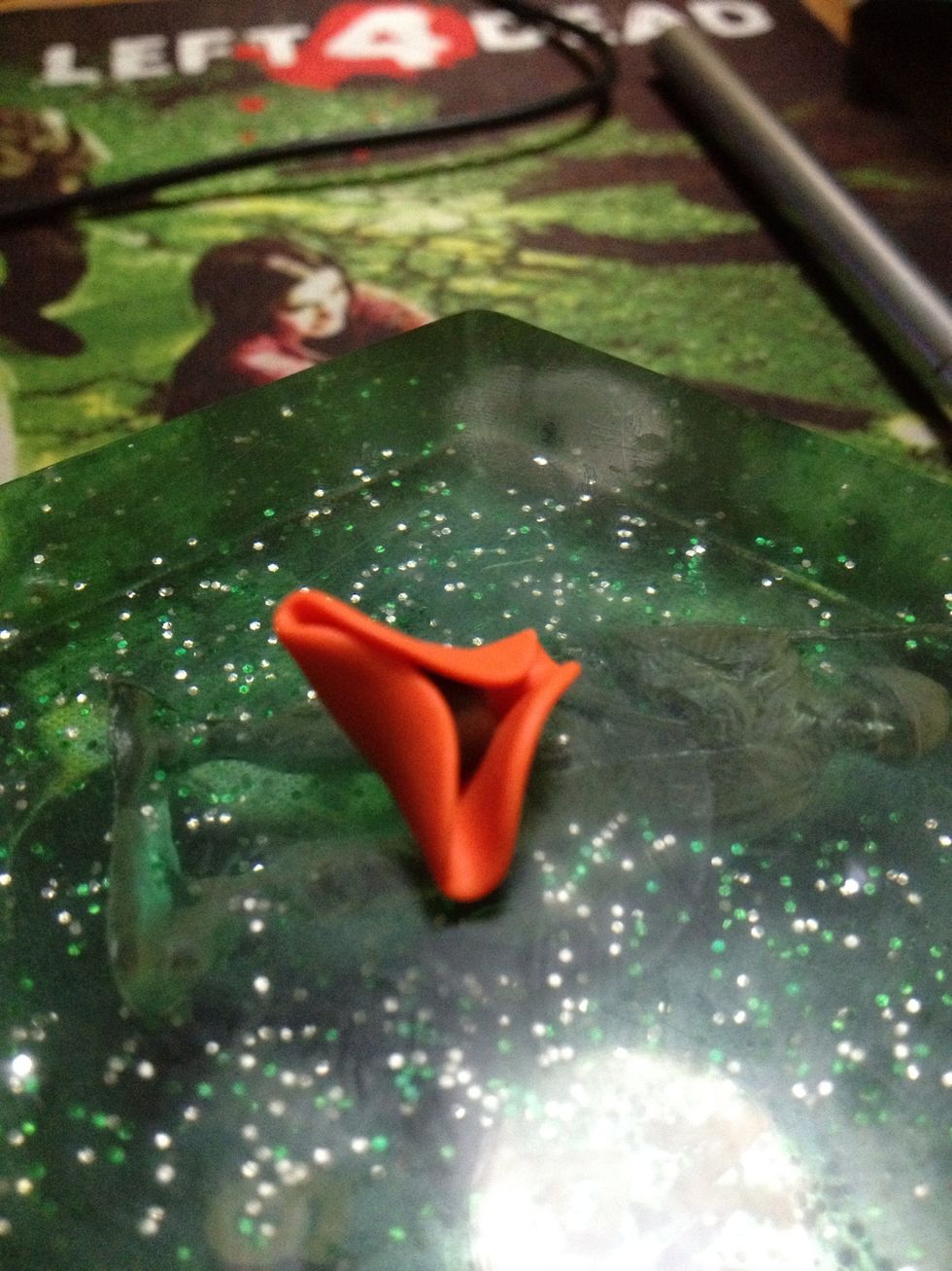 Wrap the coloured clay around the brown clay.