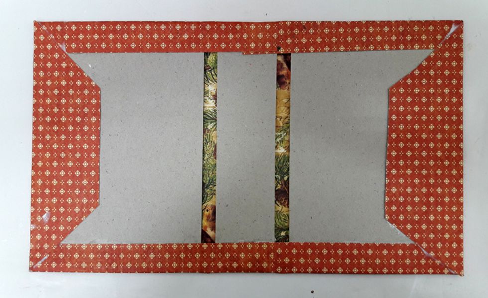 Wrap the cover with the paper. After the glue is dry close the cover gently.