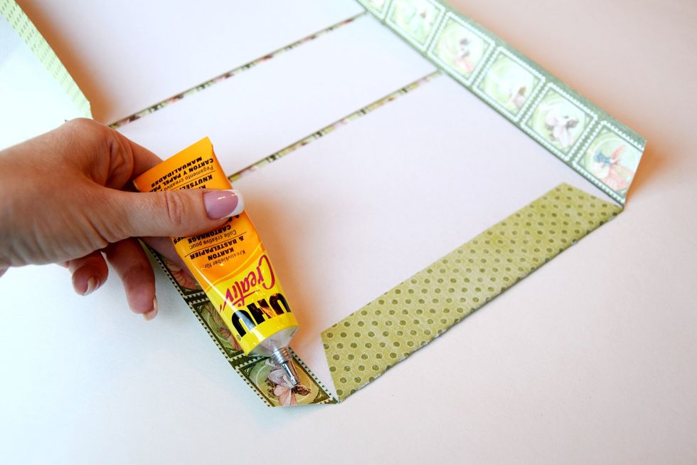 Wrap the cover with the paper.