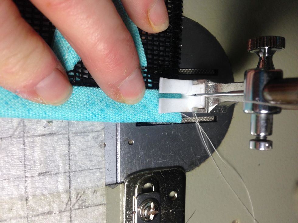 Wrap the excess end of the band around to the right side, then fold the top of the band down and topstitch.  Goodness gracious I need a manicure!!!