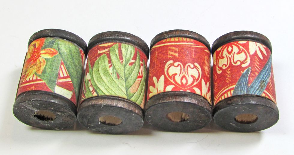 Wrap the paper around the spools and glue in place.