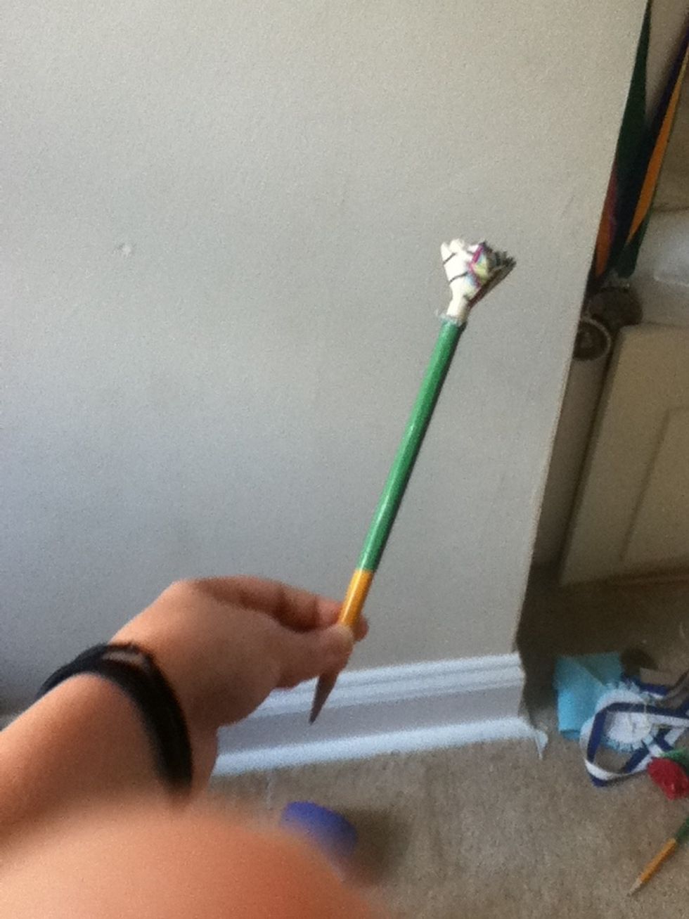 Wrap the pencil thats below the flower in green duck tape make sure you DON'T cover the end of the straw you can see unless you dont want it to be removable