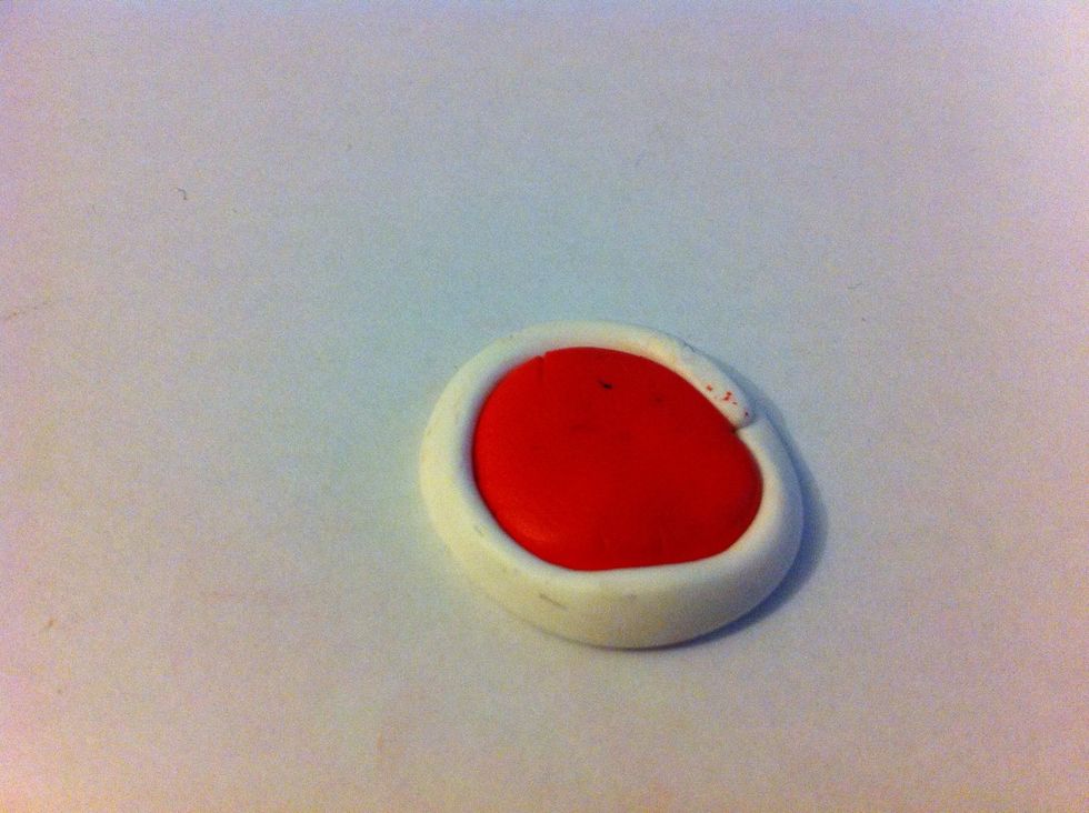 Wrap the red circle with a whith strip.