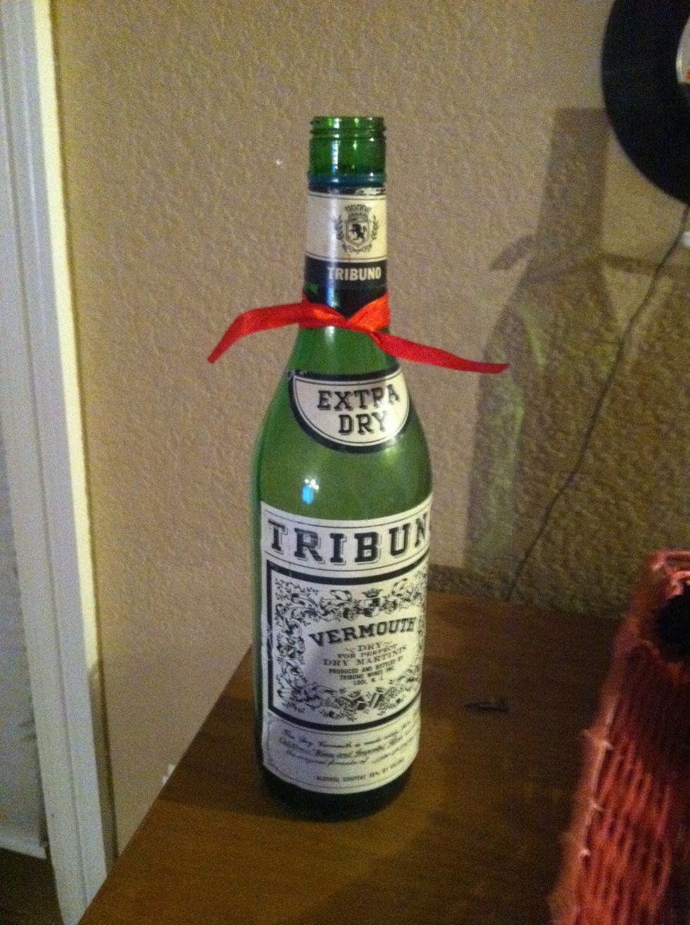 Wrap the ribbon around the thin top, not to much to take Away from the look. :p