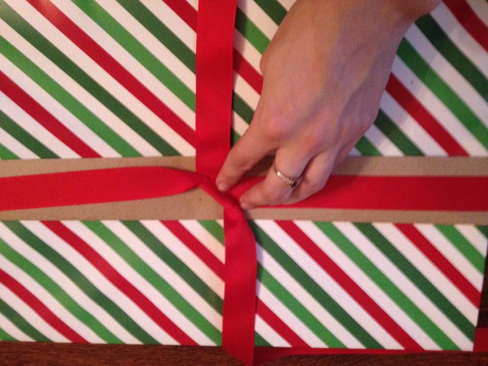 Wrap the ribbon around your box and tie.
