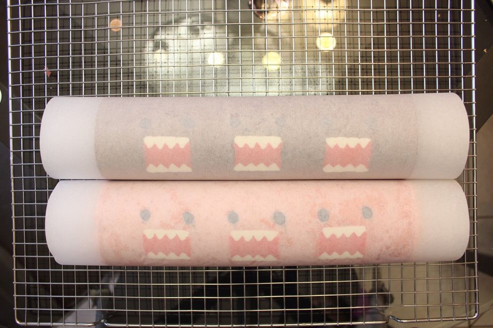 Wrap the rolls tightly in parchment paper. And then wrap again in plastic food wrap. Refrigerate for 30 minutes (to give the cake a chance to firm up). You can also freeze the cake at this point.