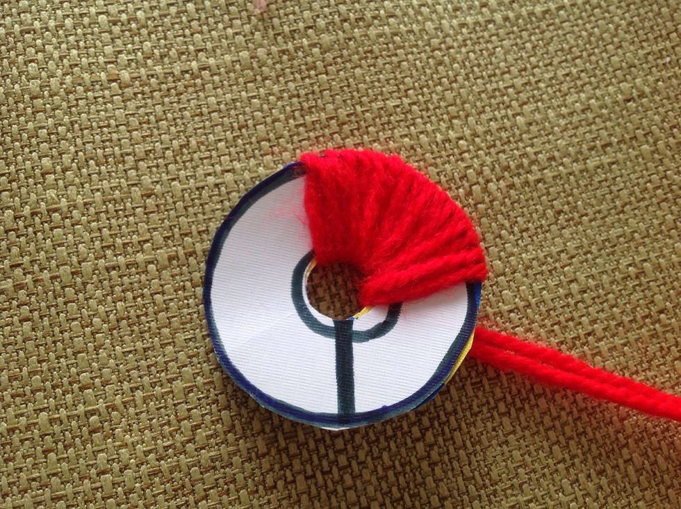 Wrap the string around the hoop.