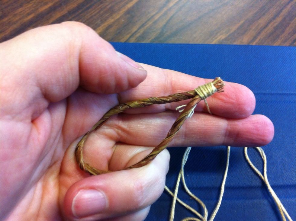 Wrap the thread around the ends to bind them together. Wrap it twelve times or so.