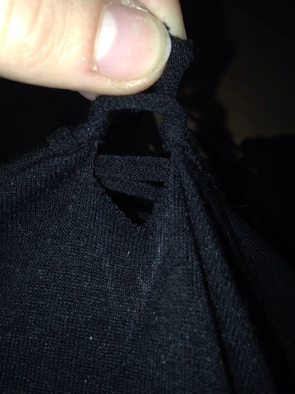 Wrap the two string around the string above them and tie a knot