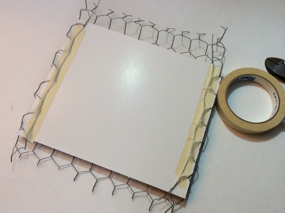 Wrap the wire around the pane. Tape down the edges. (This is a super pokey process, please use caution!!)