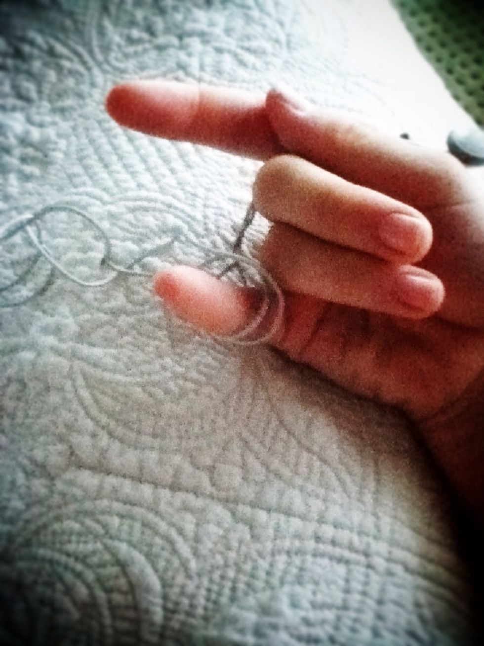 Wrap the wire around your pinkie.