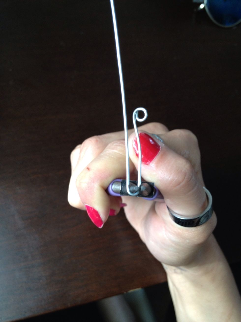 Wrap the wire opposite of the 1st loop.