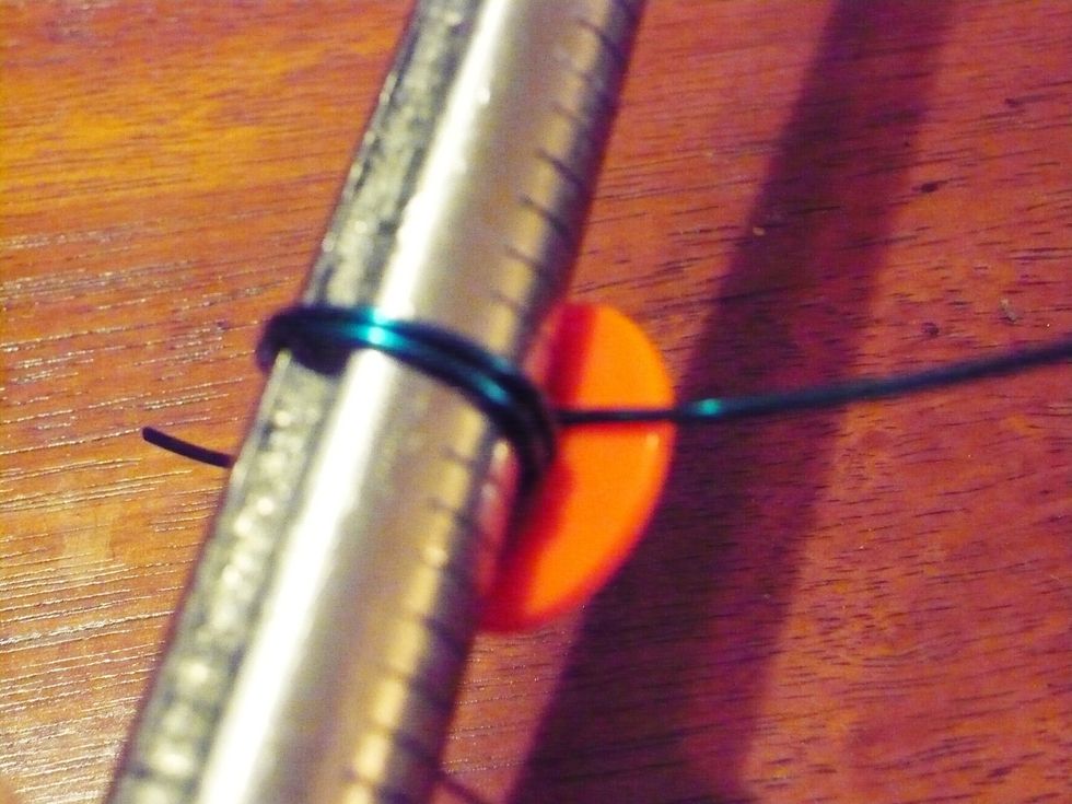 Wrap the wires between the mandrel and Buttons tightly as many times as you can. Wrap in the same direction. I tend to go clockwise.