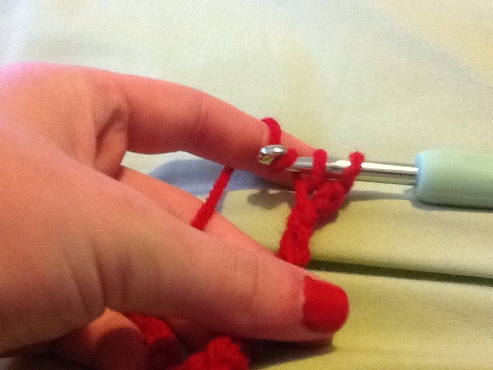 Wrap the yarn around again