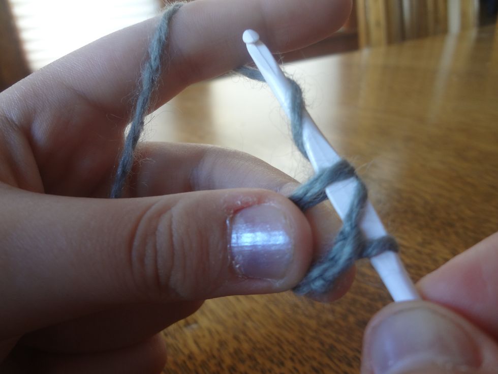 Wrap the yarn around the needle,