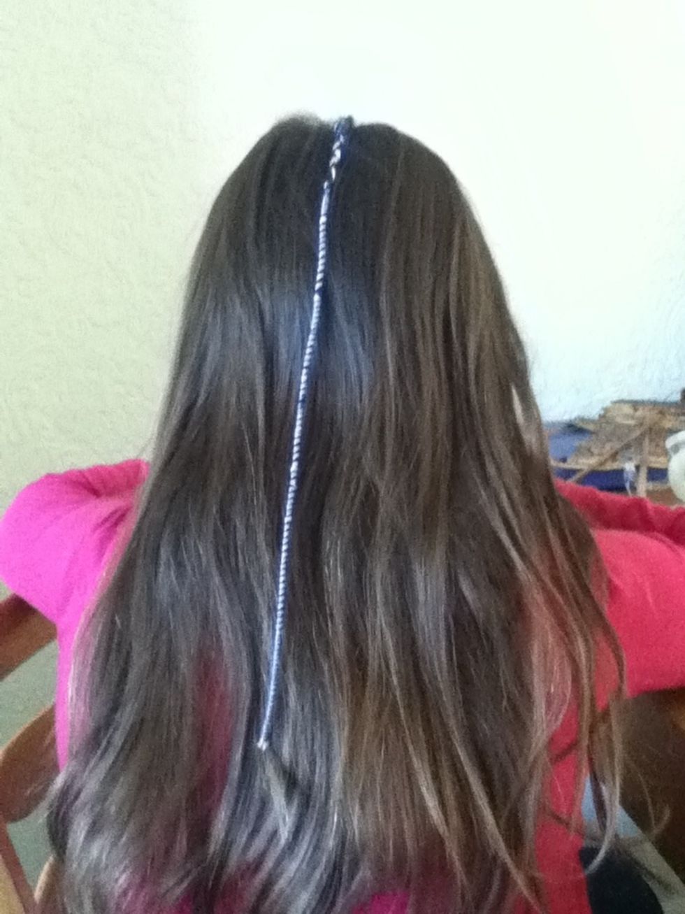 Wrap thread round hair until finished then tie a loose slip knot at the end. Add a bead if desired