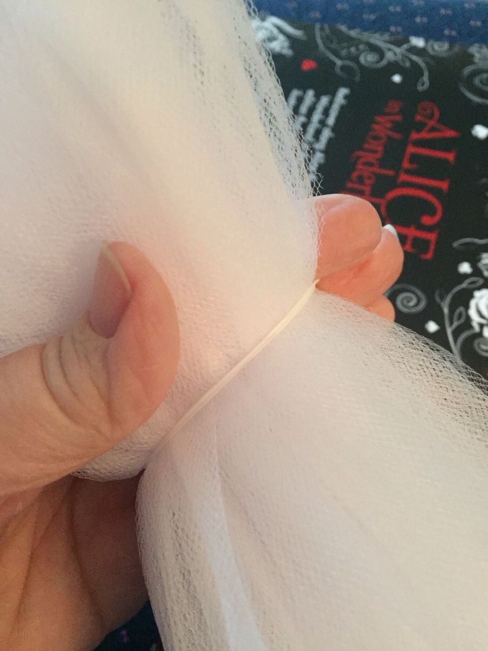 Wrap tightly with rubber band.