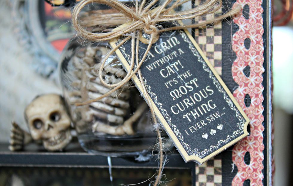 Wrap twine around jar and tie chipboard tag into place with bow.