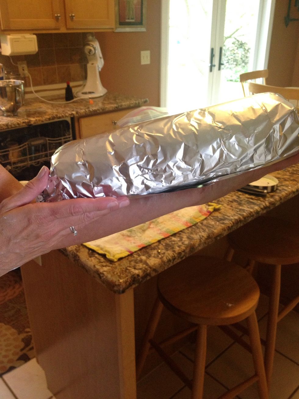 Wrap up the cake and it is ready to be stored! You can store it in the freezer for up to a month and serve it for many different celebrations! Ours are for graduation!