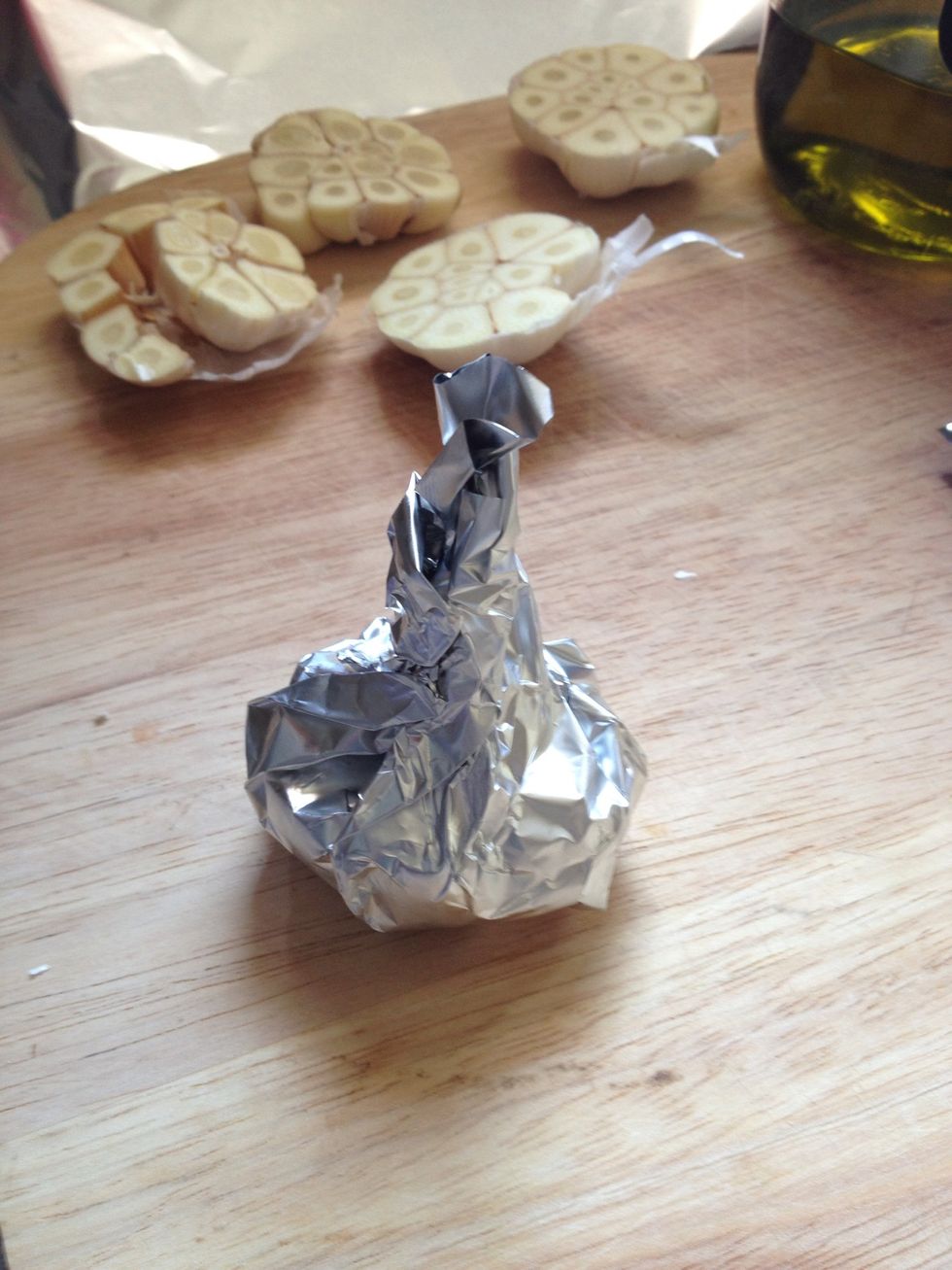 Wrap upward and tightly to keep all goodness together and toasty. Still looks like a garlic don't it?